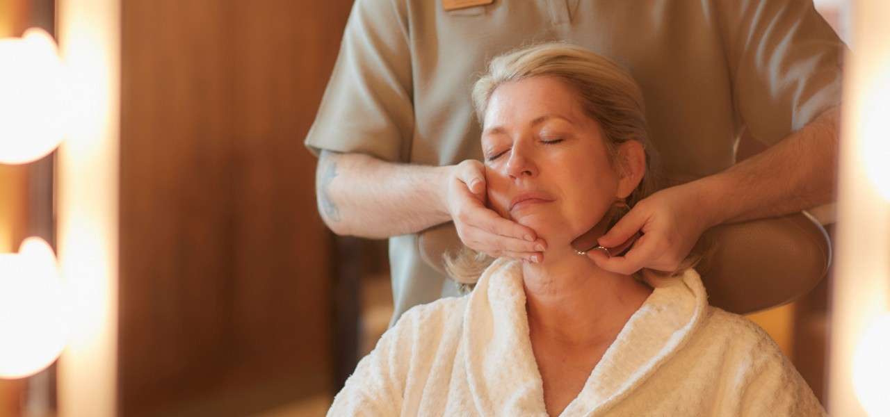 Women having a sculpting facial massage.