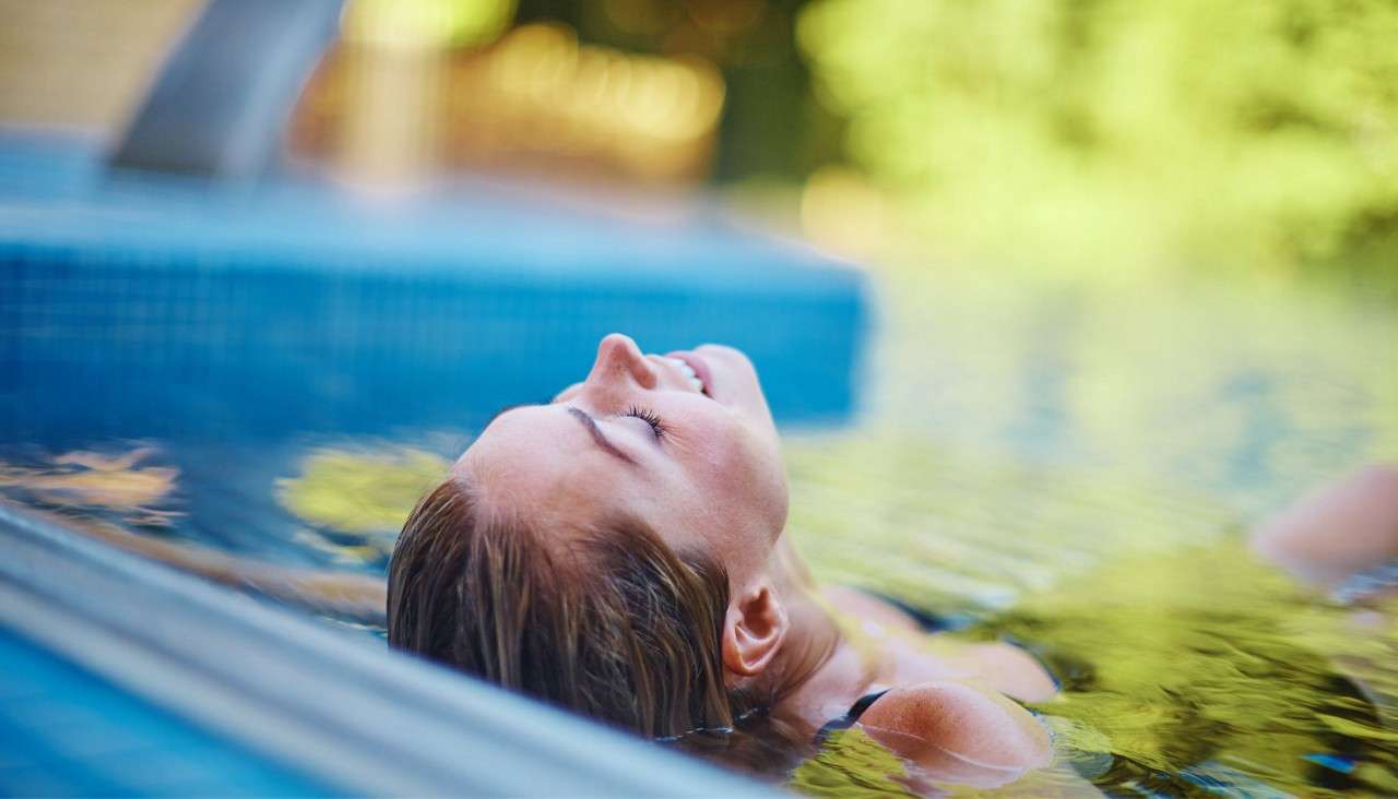 Woman in outdoor pool