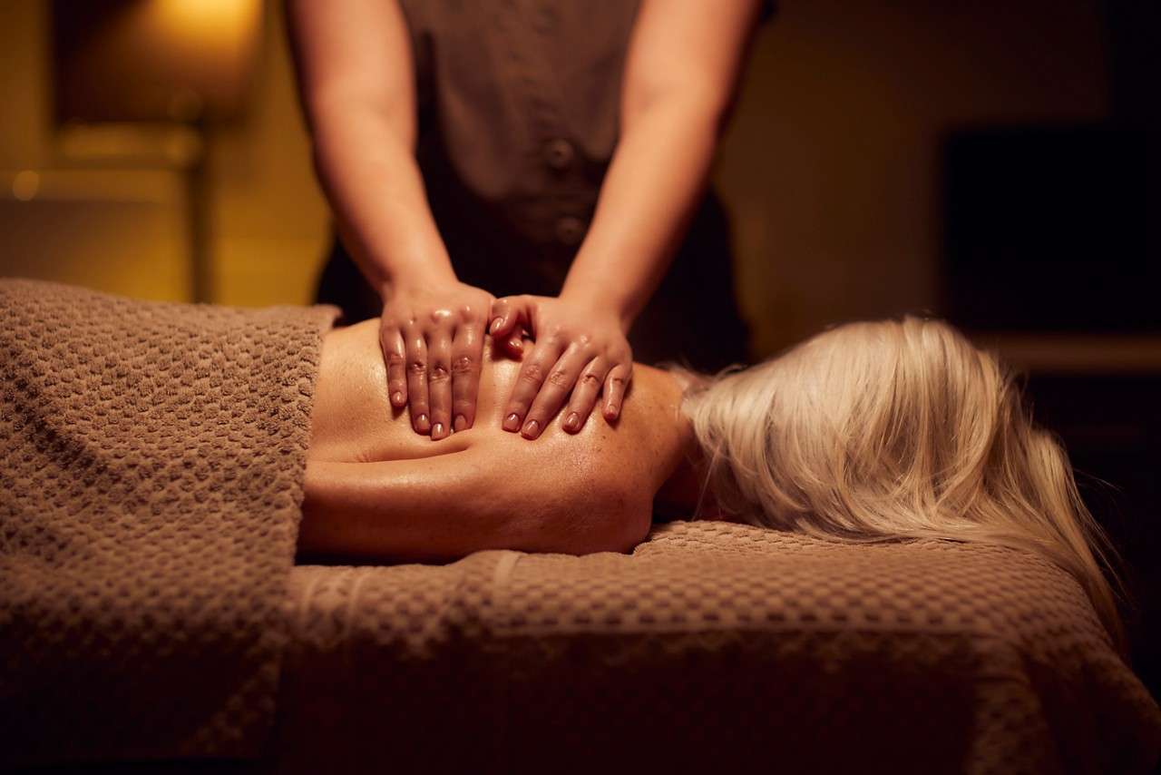 Women lying on a spa bed getting a back massage