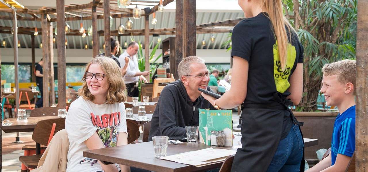 A family of four sat down dining at Las Iguanas