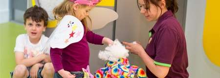 A girl making a teddy
