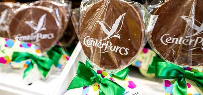 Chocolate lollies with the Center Parcs logo.