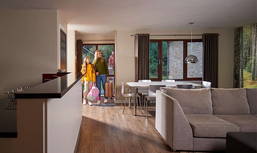 A family walking in to their lodge.