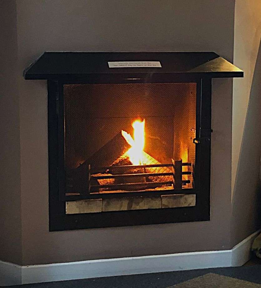 A log burner inside a lodge