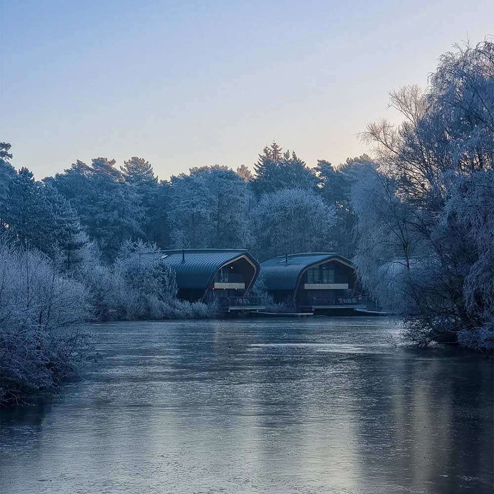 The Waterside Lodges at Elveden Forest in winter.
