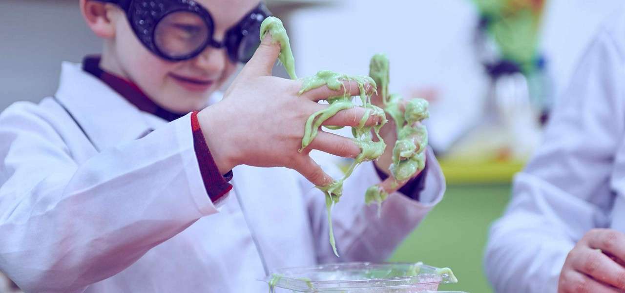 young boy taking part in crazy science