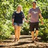 Family walking trough the forest.