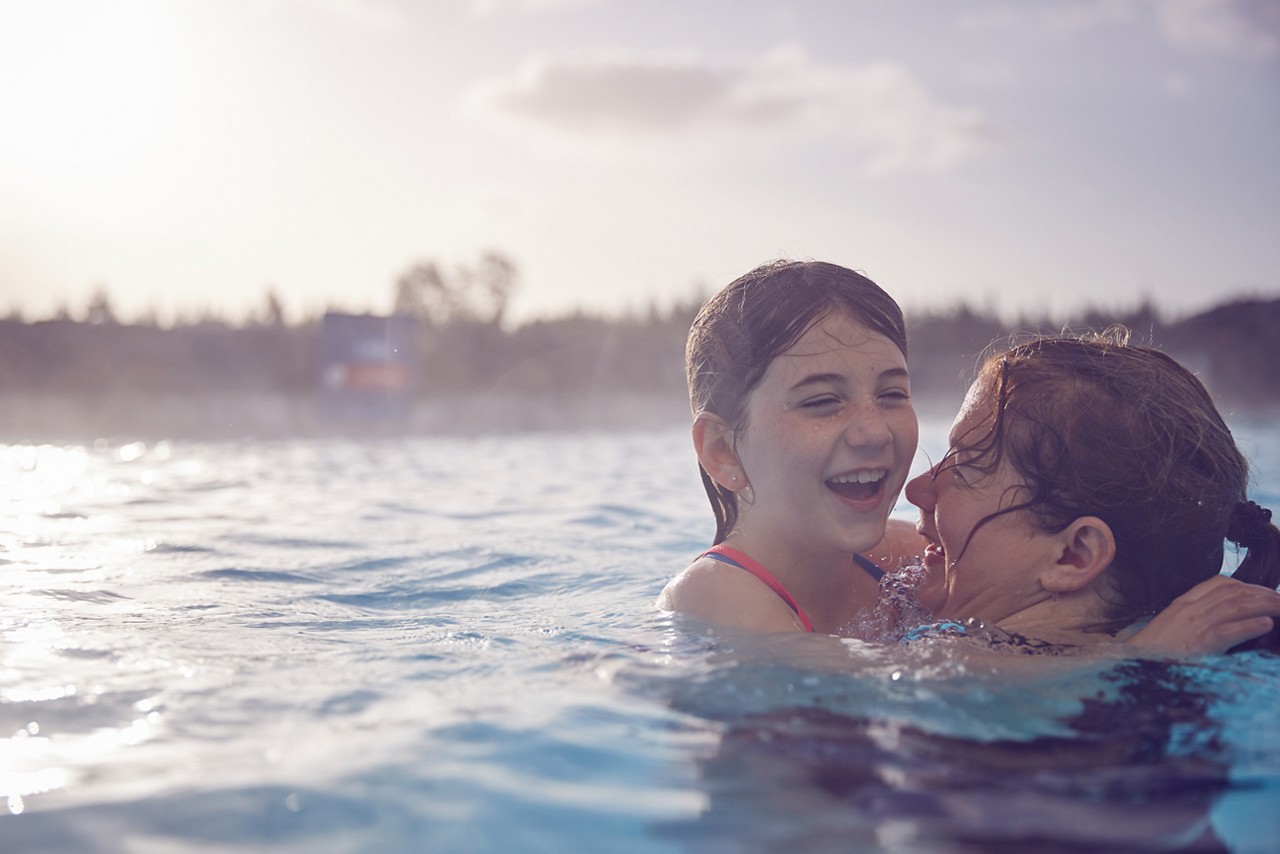 Group in an inflatable going down the Tropical Cyclone.