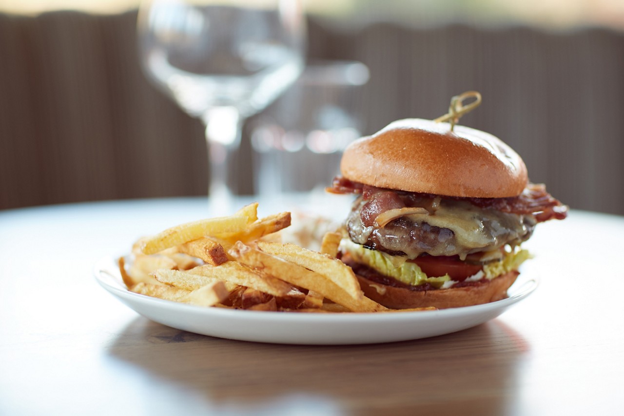 Stacked burger and fries.