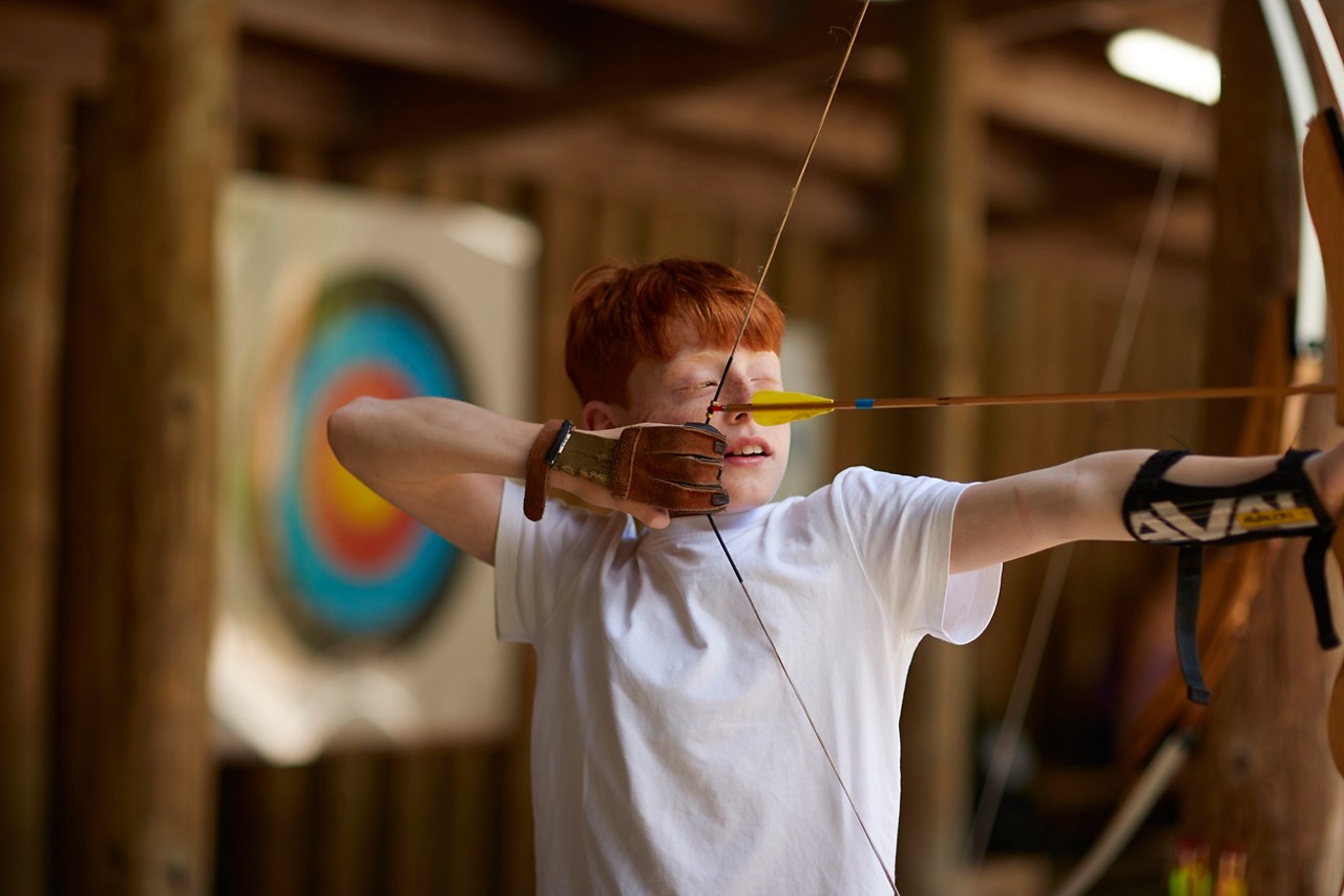 Young person doing Target Archery practice.