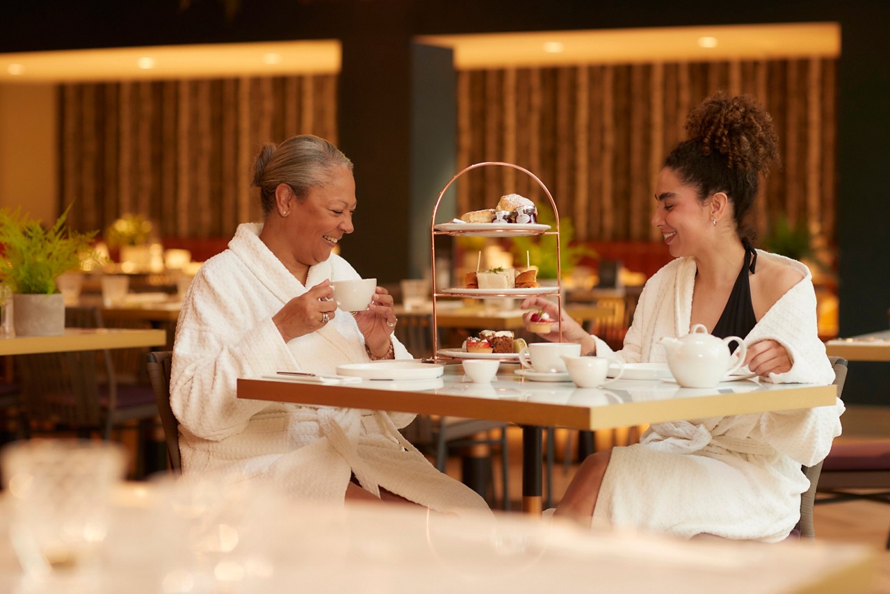 mother and daughter having afternoon tea