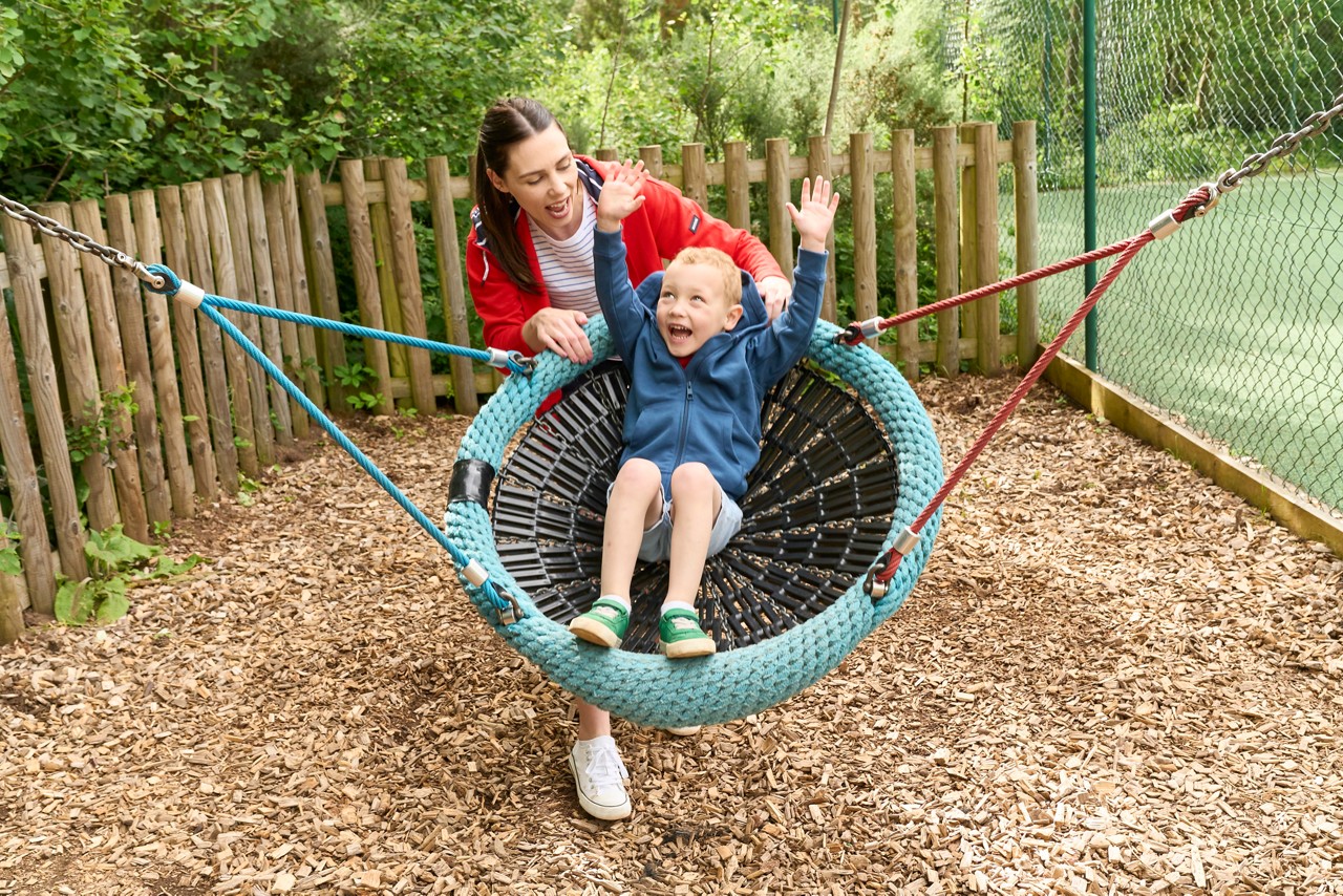 Toddler on his scooter.